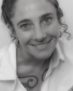 Black and white headshot of Aviva Reed