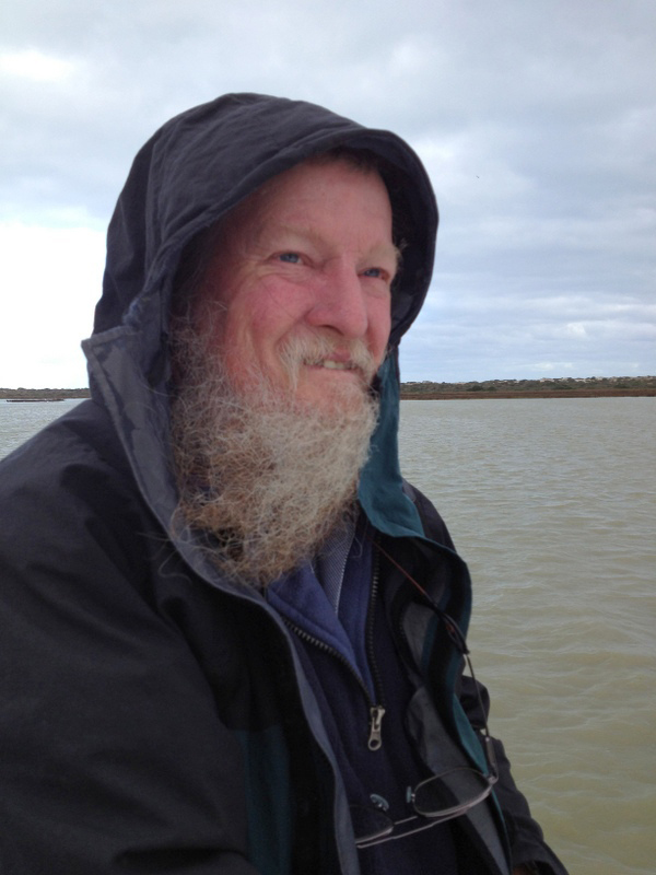 Ian outside with water in background