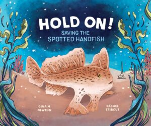 Cover of 'Hold on!' featuring an illustration of a spotted handfish on the ocean floor, surrounded by seaweed.