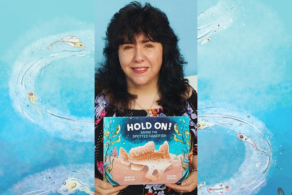 Photo of Gina Newton holding copy of her book Hold On