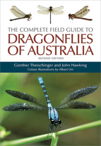 Cover of 'The Complete Field Guide to Dragonflies of Australia, Second Edition' featuring a large blue dragonfly resting on a green stalk, with three smaller dragonfly images above the title.