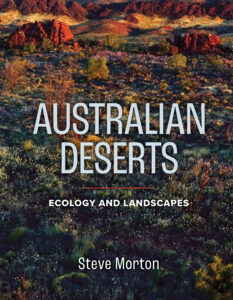 Cover of 'Australian Deserts: Ecology and Landscapes', featuring a photo of a desert landscape with various plants in the foreground transitioning to rock formations in the background.